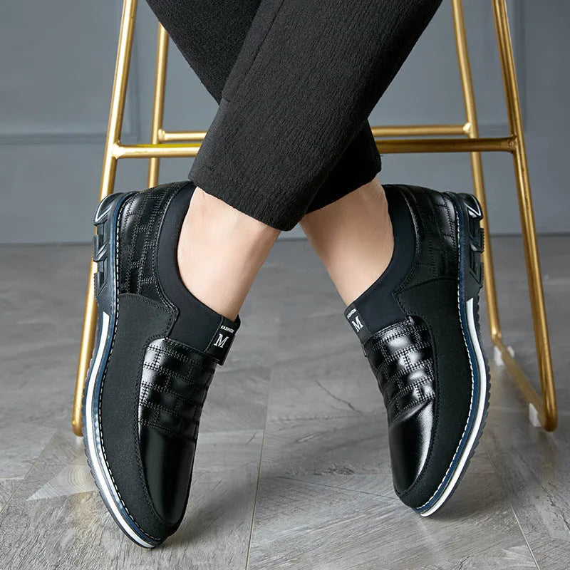Men's leather casual shoes in blue, black, brown, and white colours showing low-cut design and extended sizing options