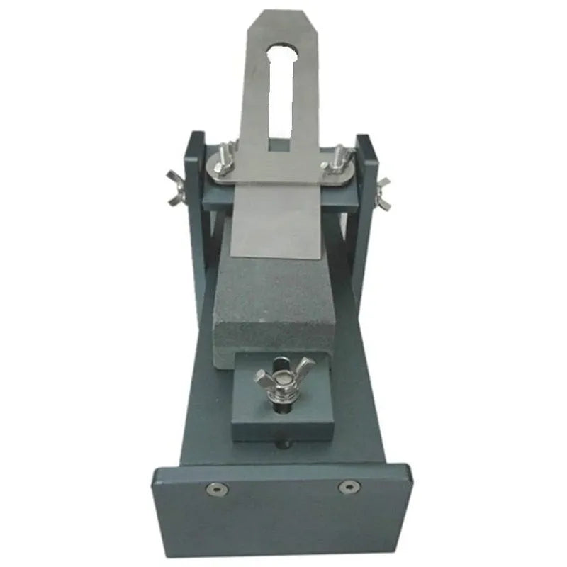 Fixed angle woodworking sharpening tool for chisels and planers made from silver aluminium alloy.