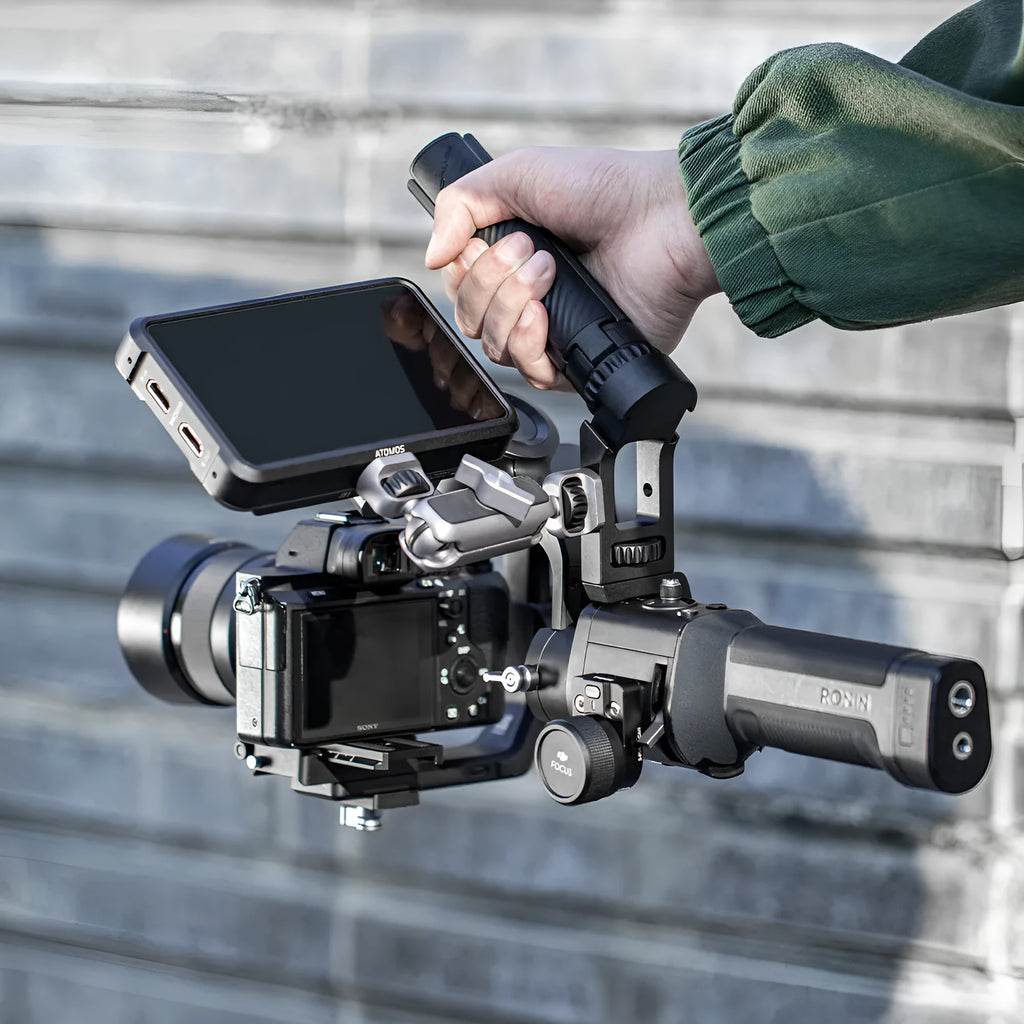 PGYTECH aluminium gimbal adapter for DJI Ronin S and SC on a tripod with accessory mounts visible.