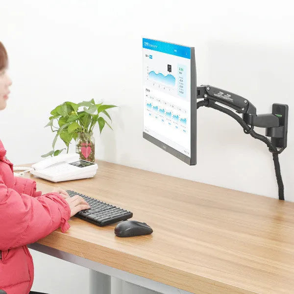 Black wall-mounted monitor stand with telescopic arm and rotating screen mount for VESA compatible displays.