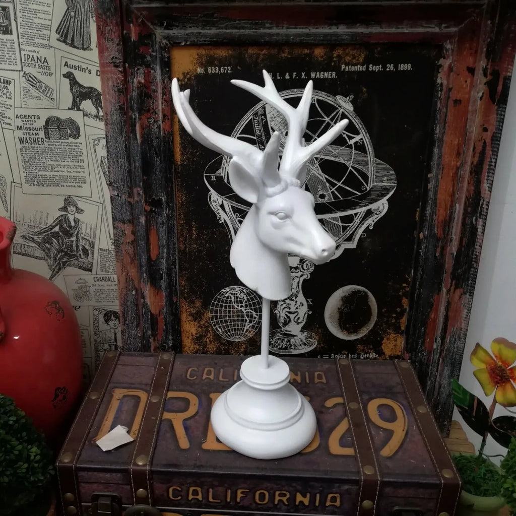 Handcrafted natural resin animal sculpture for home décor in black, white, or wood colour, 32cm tall.
