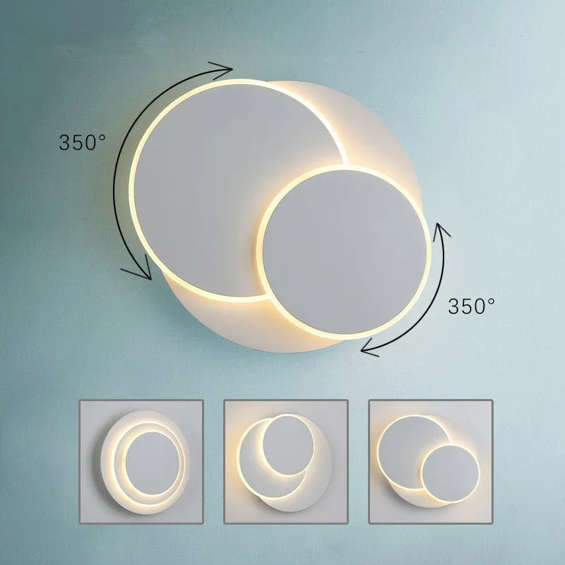 Modern round wall lamp in black or white with LED light and three size options