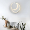 Modern round acrylic LED wall lamp with push button switch in black or white finish