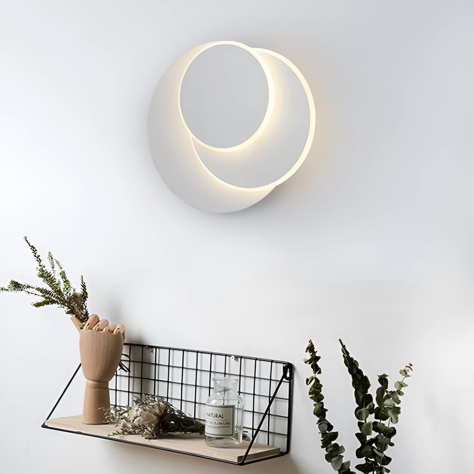 Modern round acrylic LED wall lamp with push button switch in black or white finish