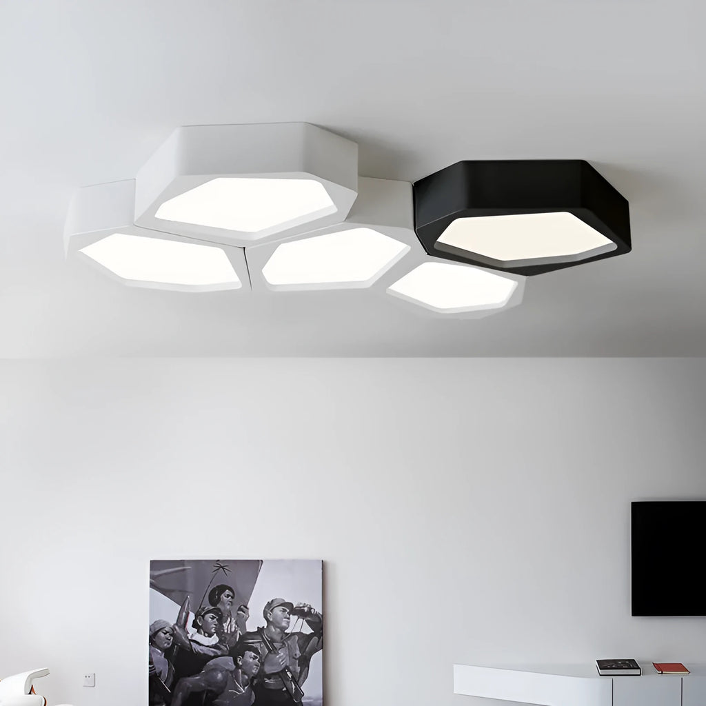 Geometric iron shade wall light with LED illumination in black or white frame