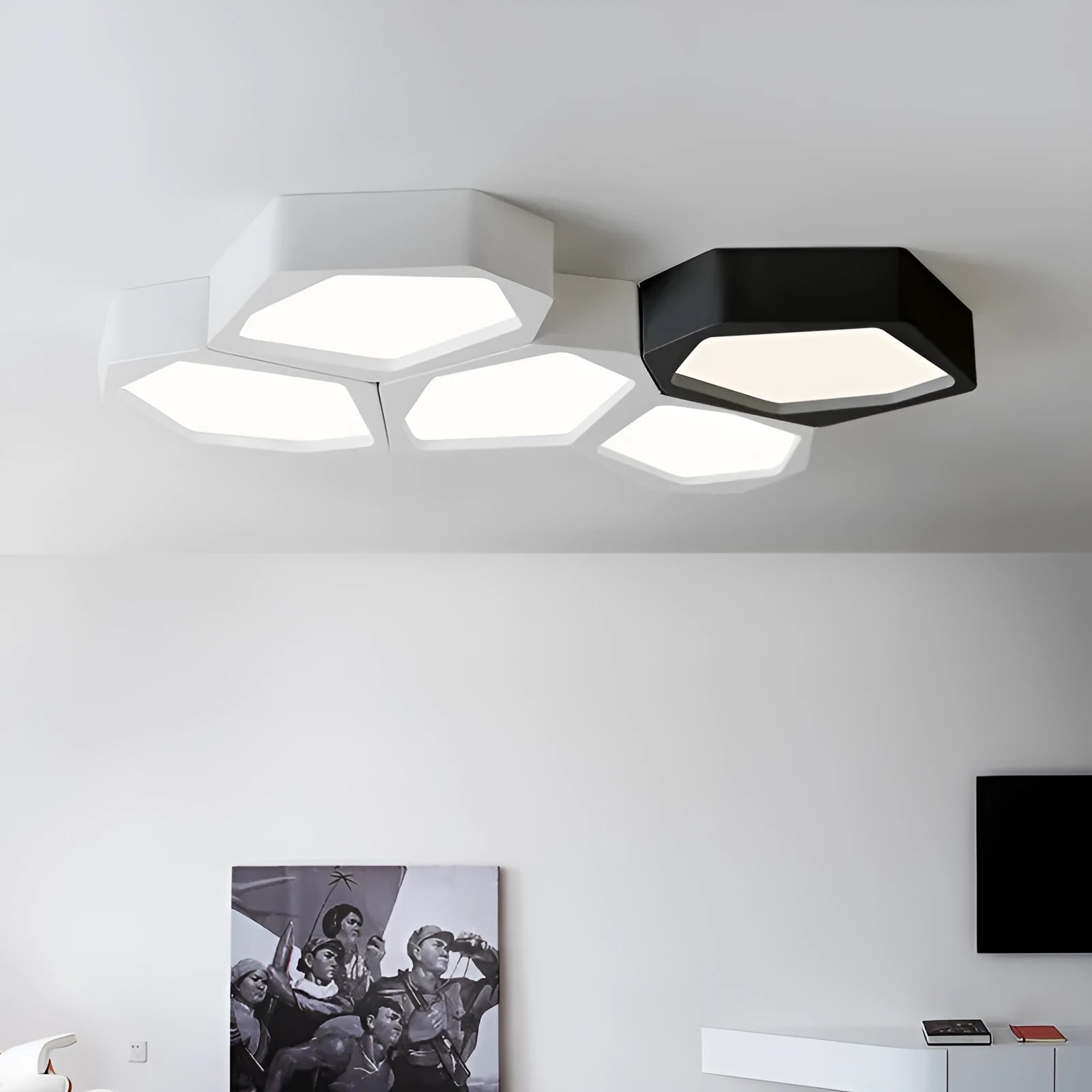 Geometric iron shade wall light with LED illumination in black or white frame