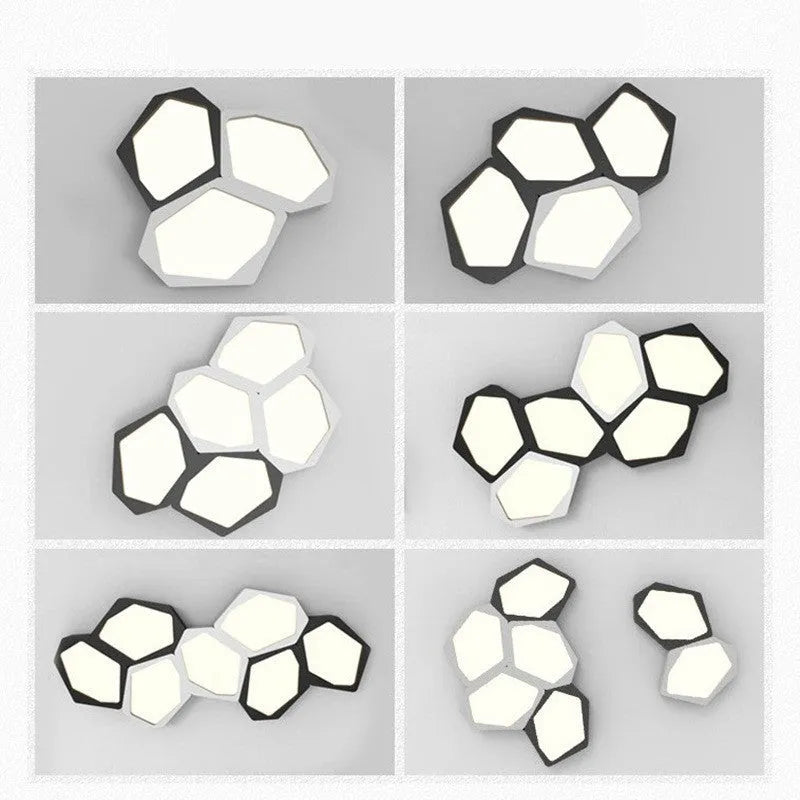 Geometric iron shade wall light with LED illumination in black or white frame