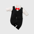 Gentleman-style baby jumpsuit in navy blue cotton, shown on a mannequin with long sleeves.