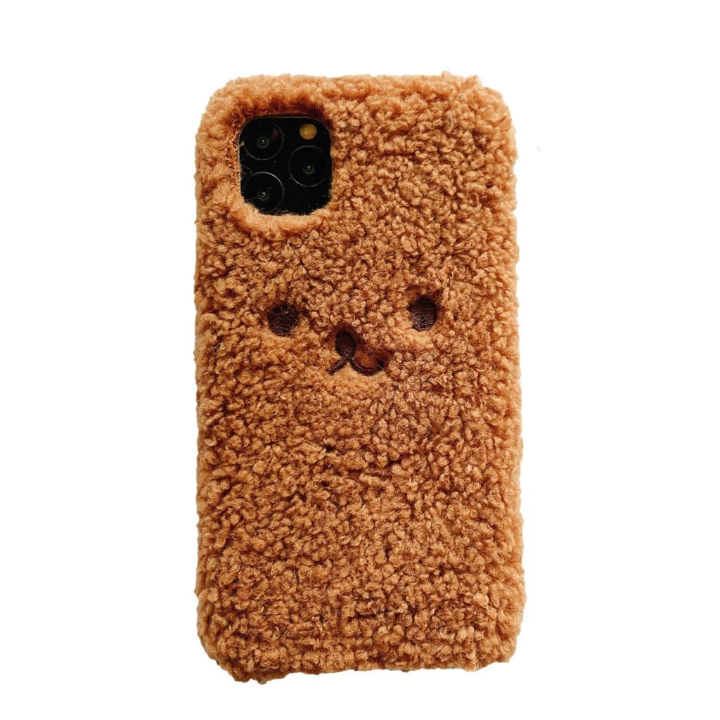 Brown embroidery plush cartoon bear face design on a flexible TPU iPhone phone case.