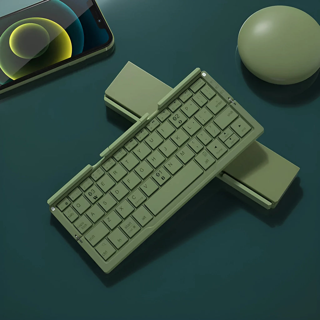 Silver white folding Bluetooth keyboard open beside smartphone showing aluminium stand