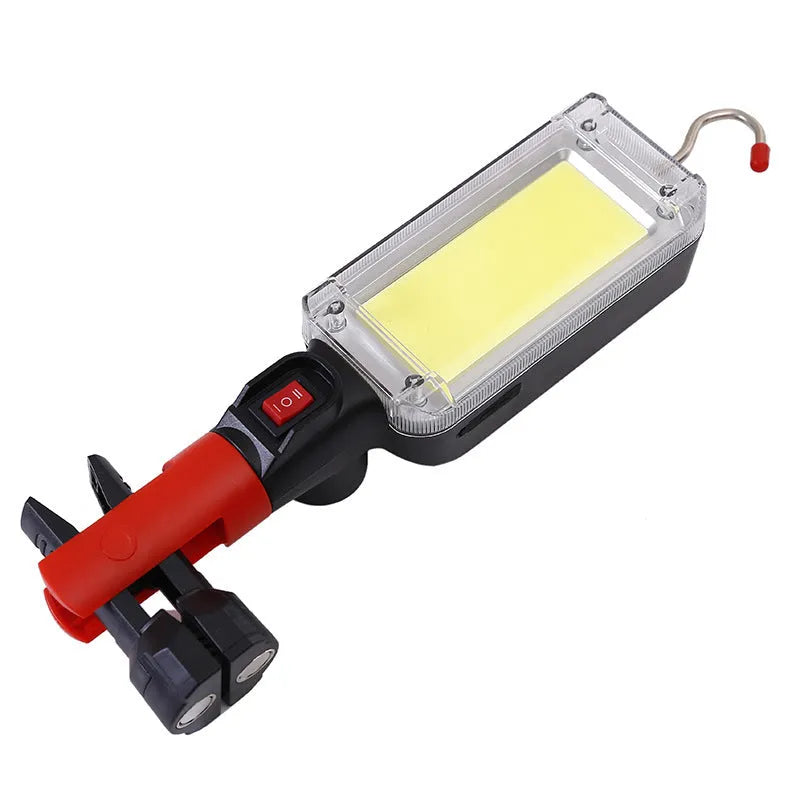 Red portable work light with magnet hook and USB charging port for camping and car maintenance