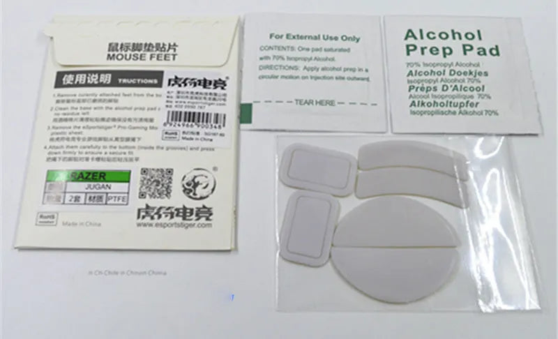 White Esports Tiger PTFE mouse skates for G PRO X Superlight on a neutral background with anti-static tweezers next to them