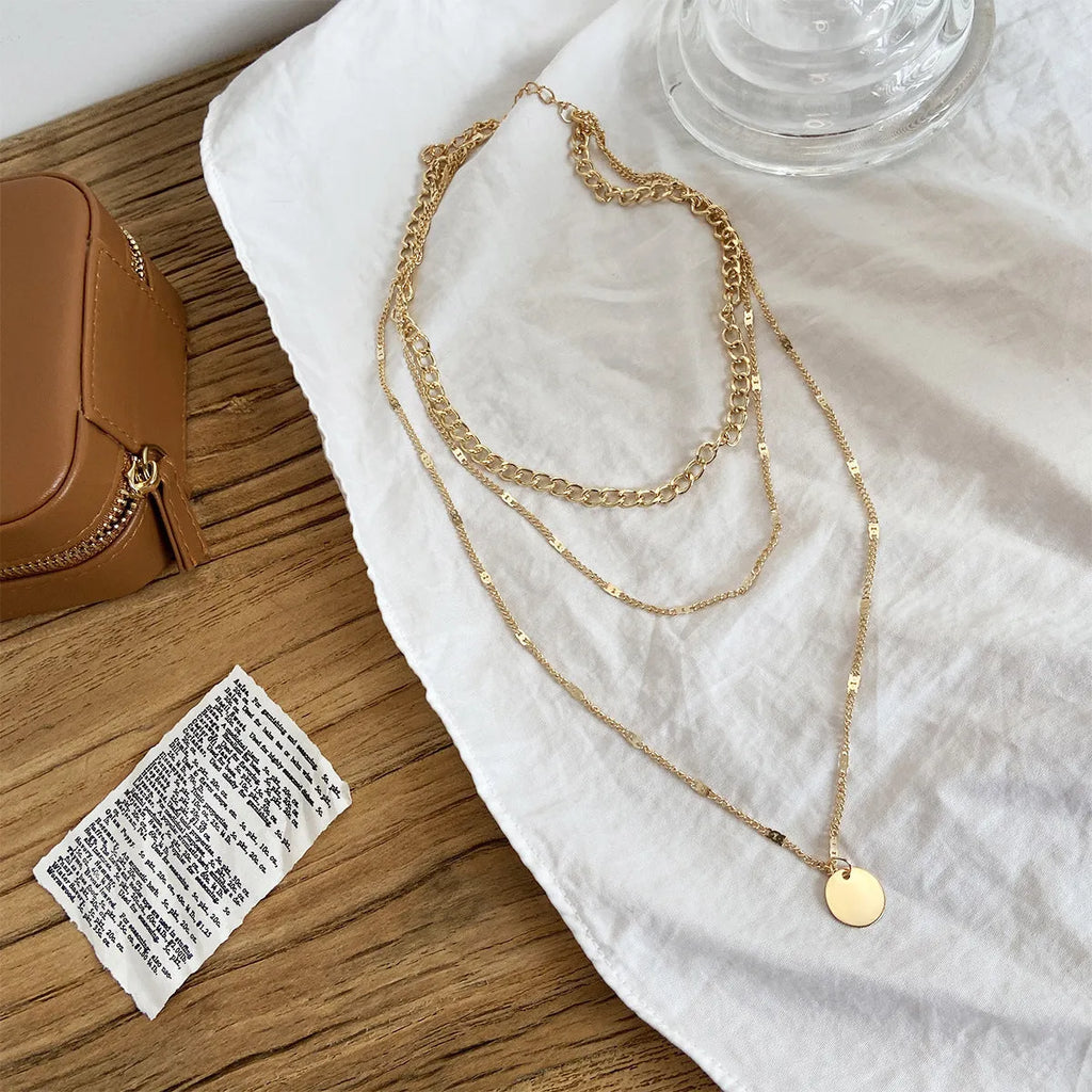 Women's multilayer disc pendant clavicle necklace in gold and silver alloy finish