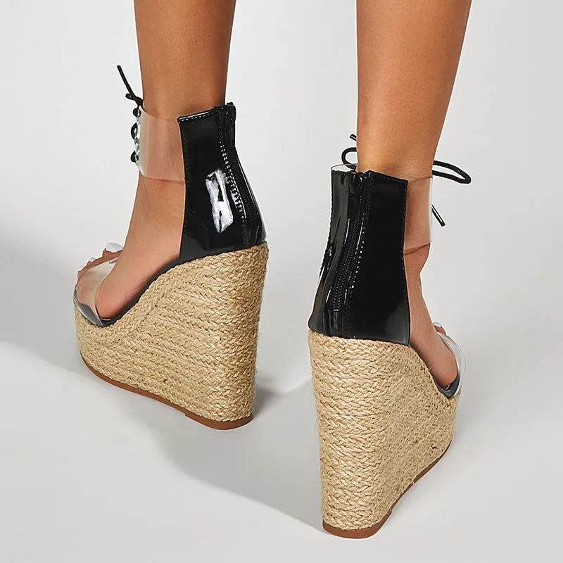 Black women's wedge sandals with hemp rope tie on a super high 8cm platform heel.