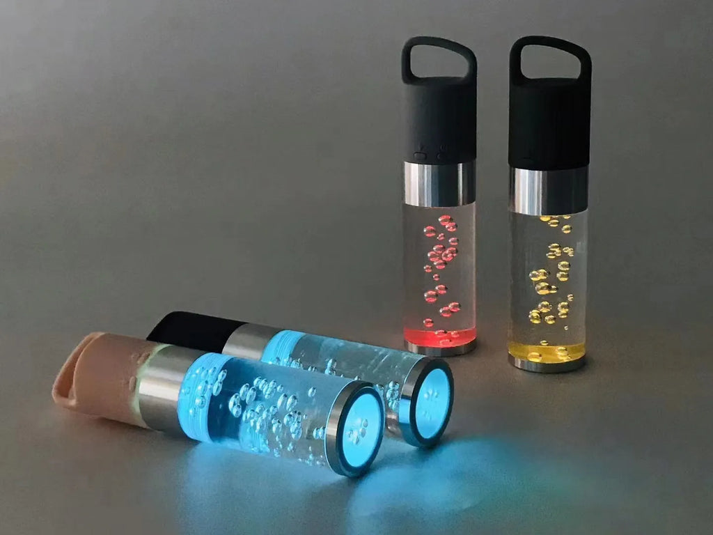 Cartoon creative Bluetooth speaker with colourful crystal lights in pink, black, silver grey, or green