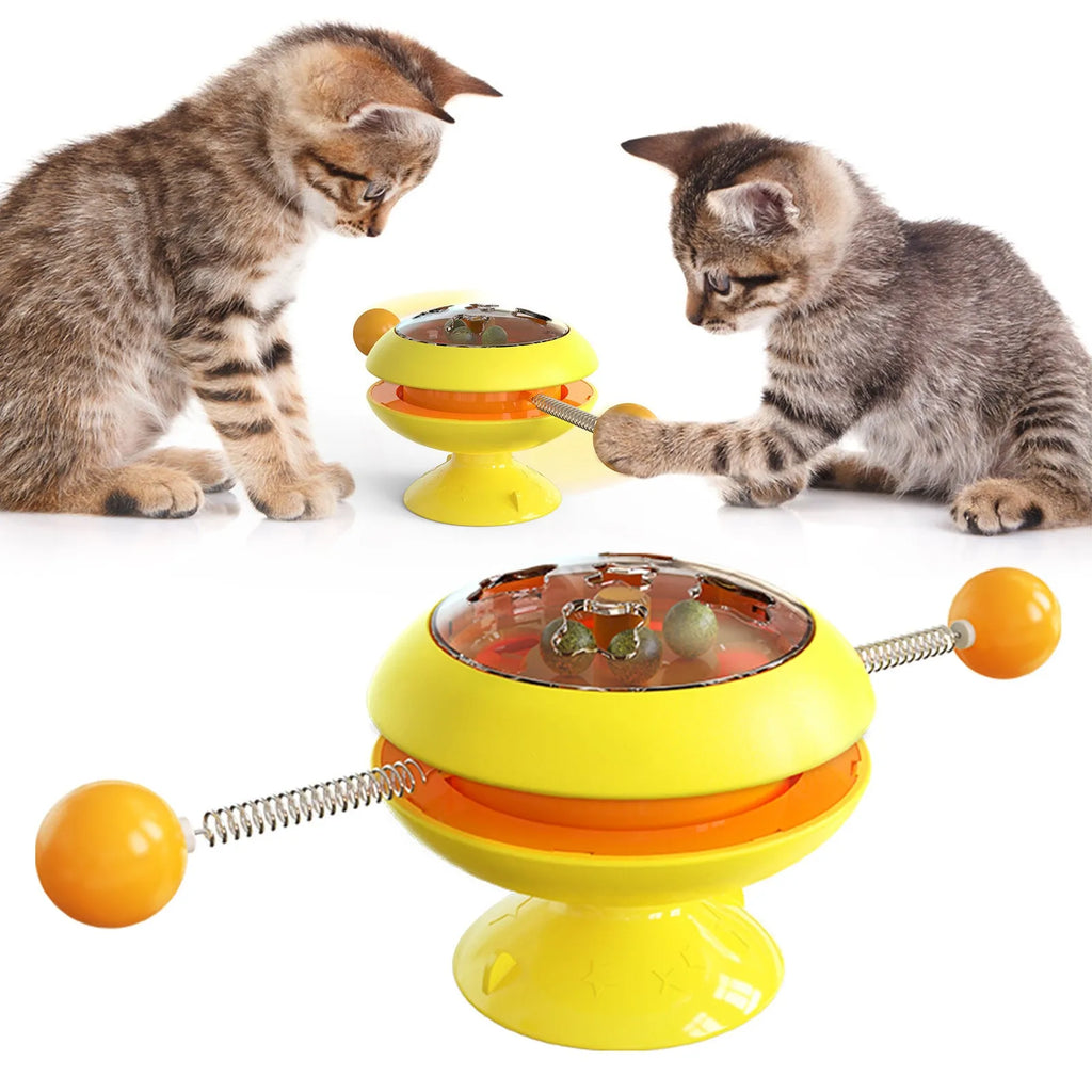 Rotatable cat toy with suction cup base and transparent top containing catnip balls in choice of four colours