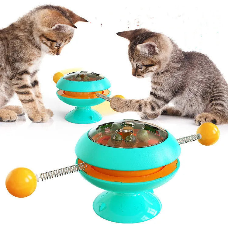 Rotatable cat toy with suction cup base and transparent top containing catnip balls in choice of four colours