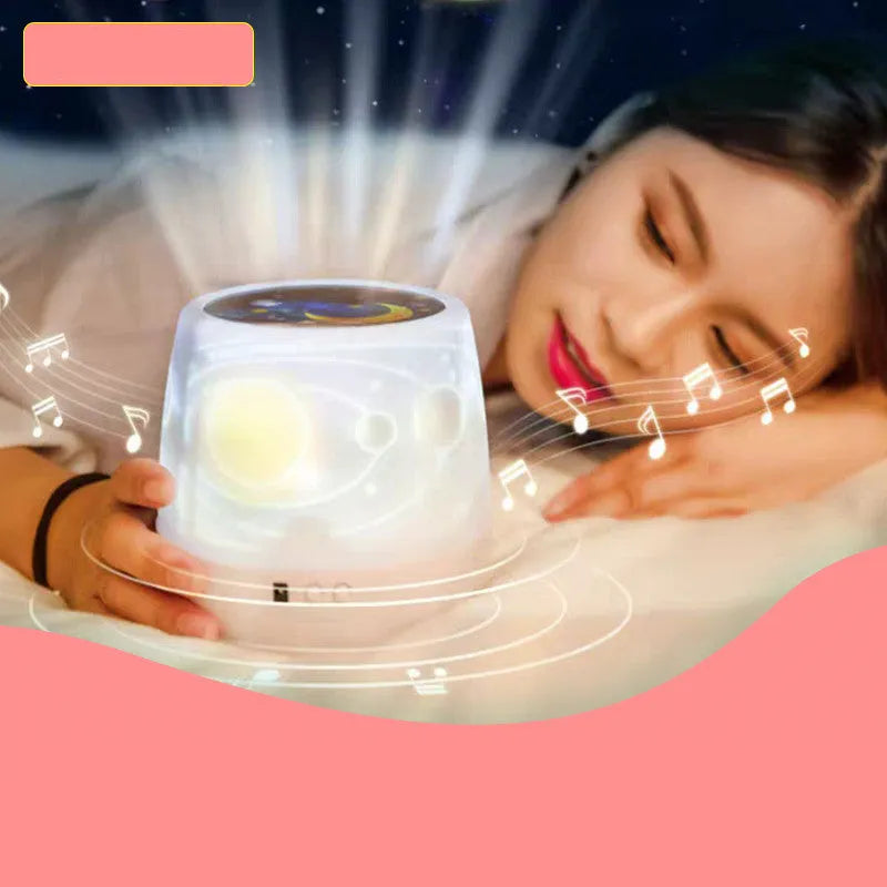 Pruixin PRX1363 rotating LED projector night light displaying star and love patterns on a wall.