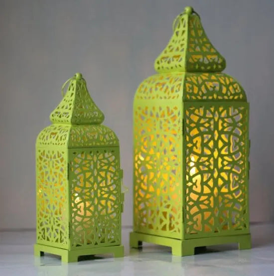 Geometric iron candlestick in retro design, shown in blue, white, or yellow colour.