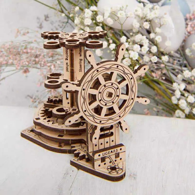 Ukrainian wooden rotating pen holder with steering wheel mechanism on wooden desktop