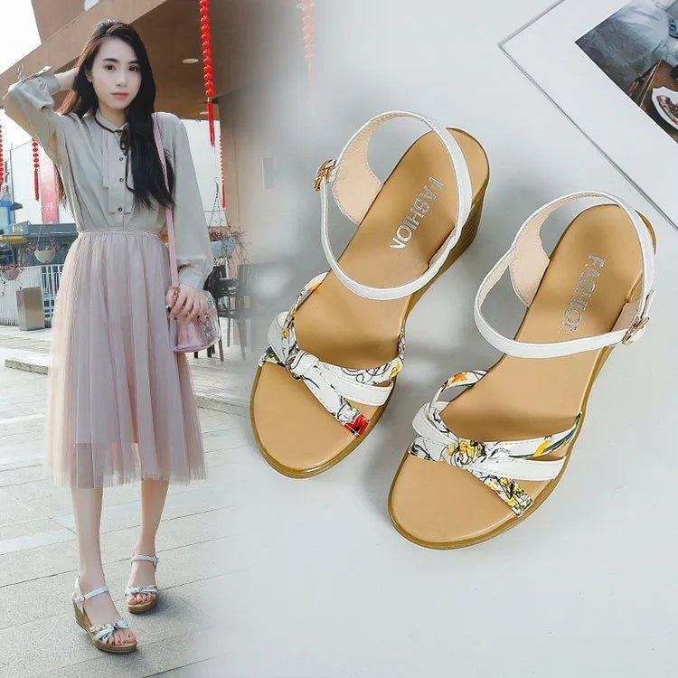 Pink and white women's wedge sandals with a thick platform sole and a single adjustable buckle strap.