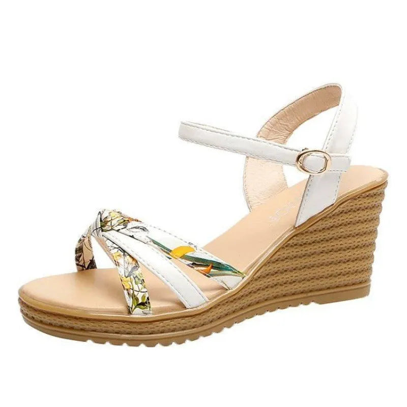 Pink and white women's wedge sandals with a thick platform sole and a single adjustable buckle strap.
