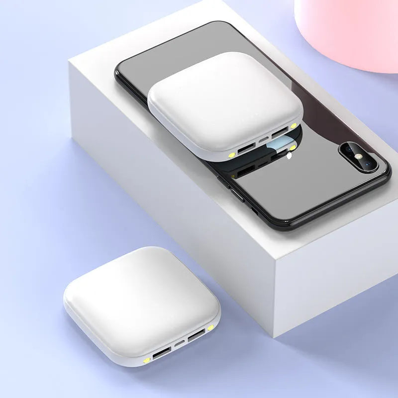 Mini 20000mAh power bank with LED flashlight in compact 82mm square design