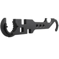 Black steel multi-function combination wrench for AR-15 and M4 rifles on a plain background.