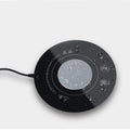 USB powered black and white hot cold coaster for beverage temperature control on a desk