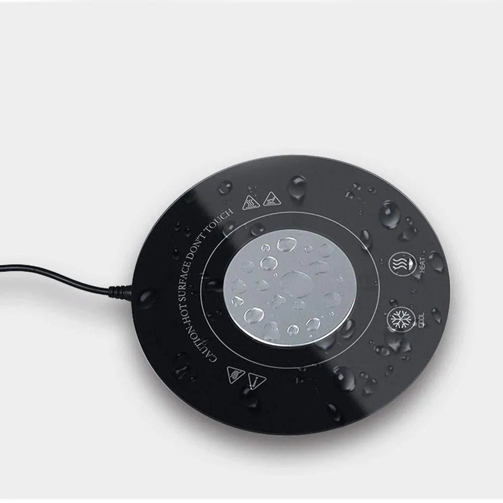 USB powered black and white hot cold coaster for beverage temperature control on a desk