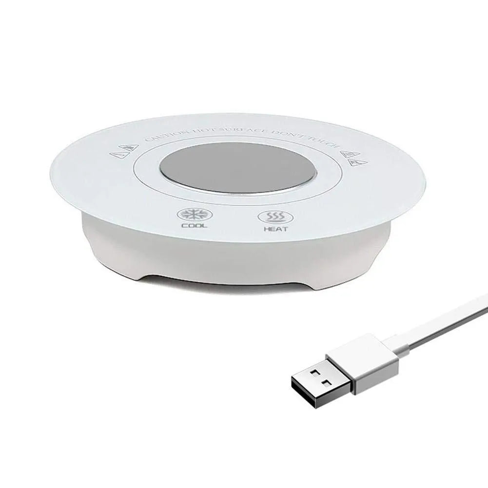 USB powered black and white hot cold coaster for beverage temperature control on a desk