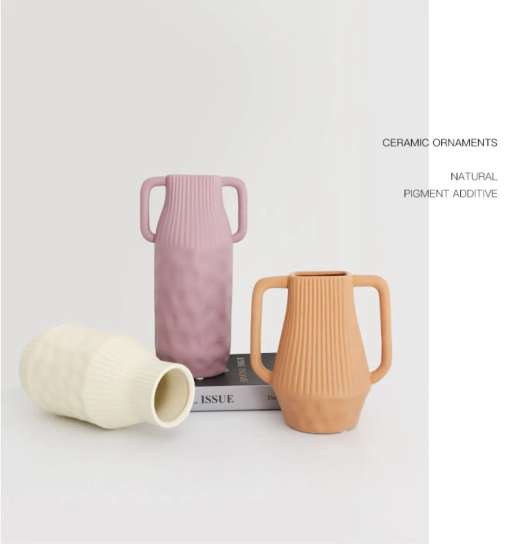 Nordic Morandi simple hammer ceramic vase in beige, brown, or purple glaze colours.