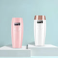 Laser beauty hair removal device in pink and white with ABS body, 15x6.5x3.5cm, includes glasses and scraper