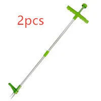 Manual weed puller with aluminium handle and plastic head on garden soil, model 1046A