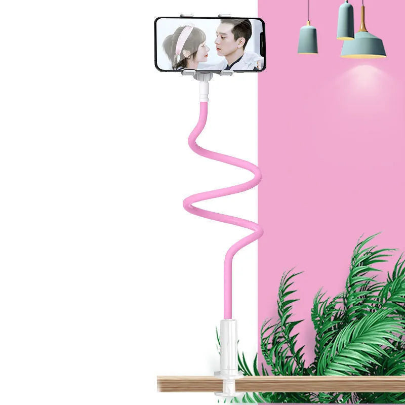 Memory alloy mobile phone holder positioned at bedside with universal adjustment for phones and tablets
