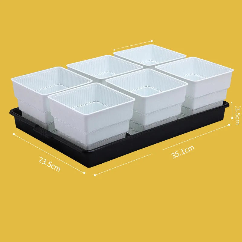 Meishi black and white resin flower pot with drainage tray for succulents and plants on a desk