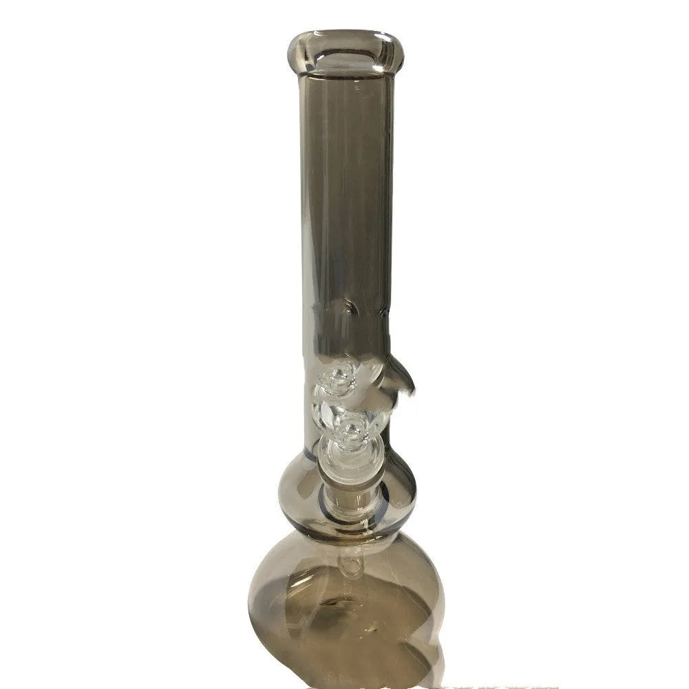 Clear geometric glass vase with stable base on a tabletop.