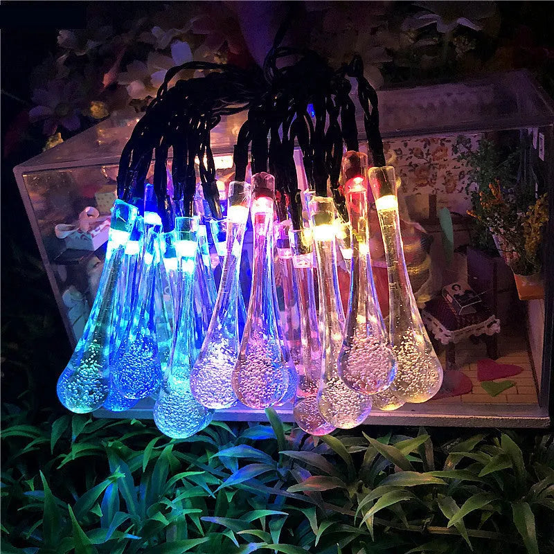 Solar-powered water drops LED string lights for outdoor garden decoration with waterproof design