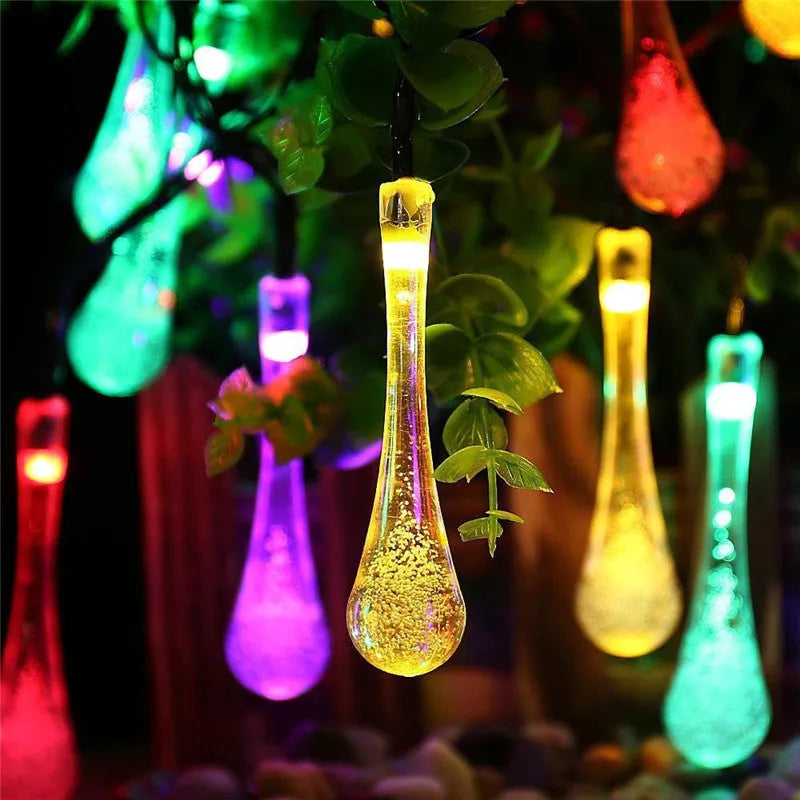 Solar-powered water drops LED string lights for outdoor garden decoration with waterproof design
