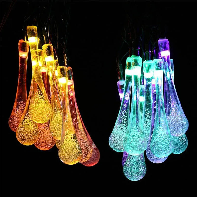Solar-powered water drops LED string lights for outdoor garden decoration with waterproof design