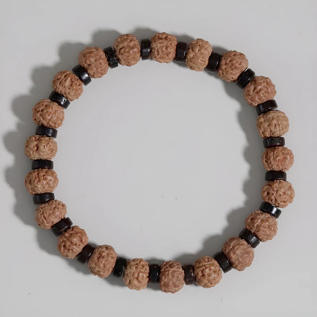 Brown volcanic stone agate beaded bracelet with rope chain on wrist