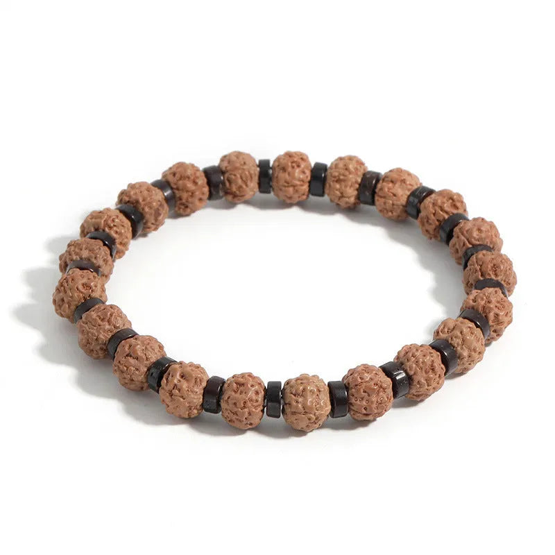 Brown volcanic stone agate beaded bracelet with rope chain on wrist