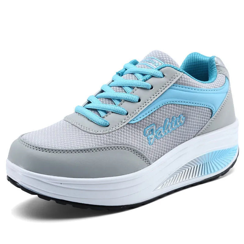 Women's grey heelless sports shoes with a mid-heel, shown alongside black and pink colour options.