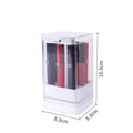 White press-lift lipstick storage box with transparent lid on a wooden desk.