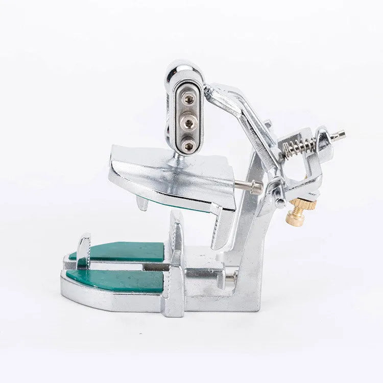 Metal Korean dental articulator with adjustable components for mounting casts.