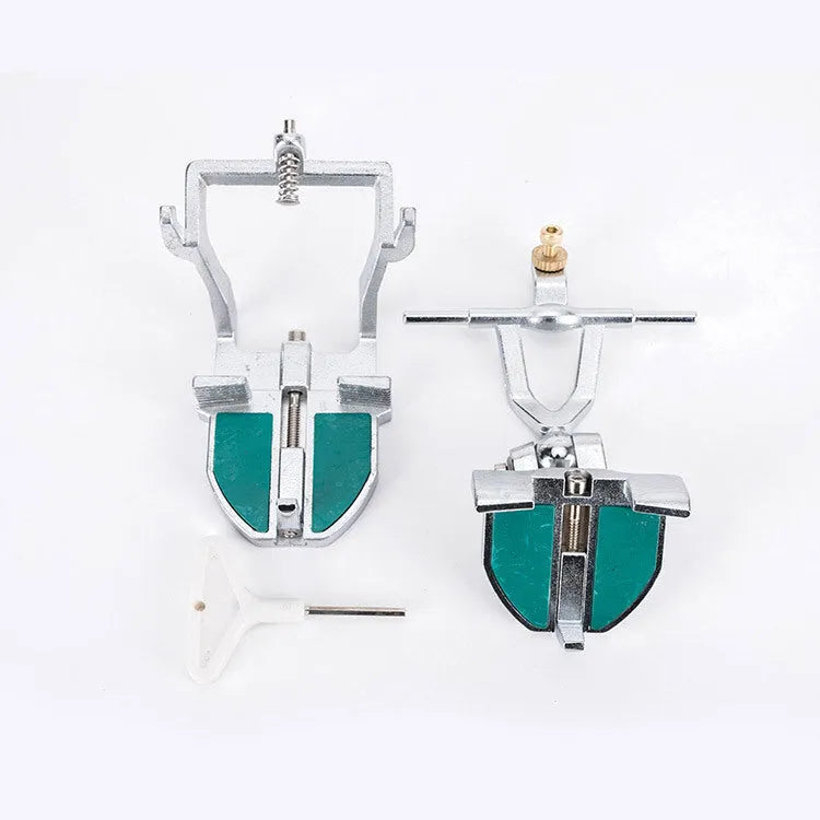 Metal Korean dental articulator with adjustable components for mounting casts.