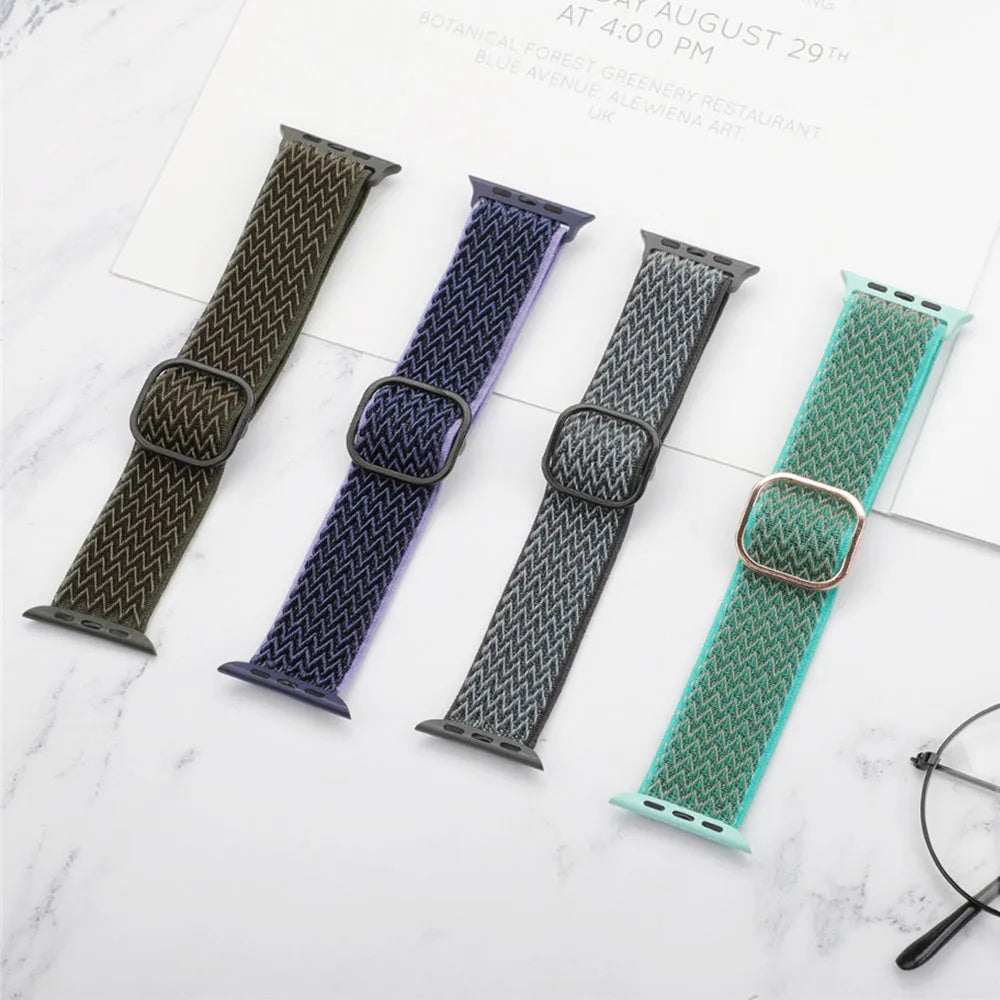 Nylon wave pattern elastic strap for Apple Watch in multiple colour options on a wrist.