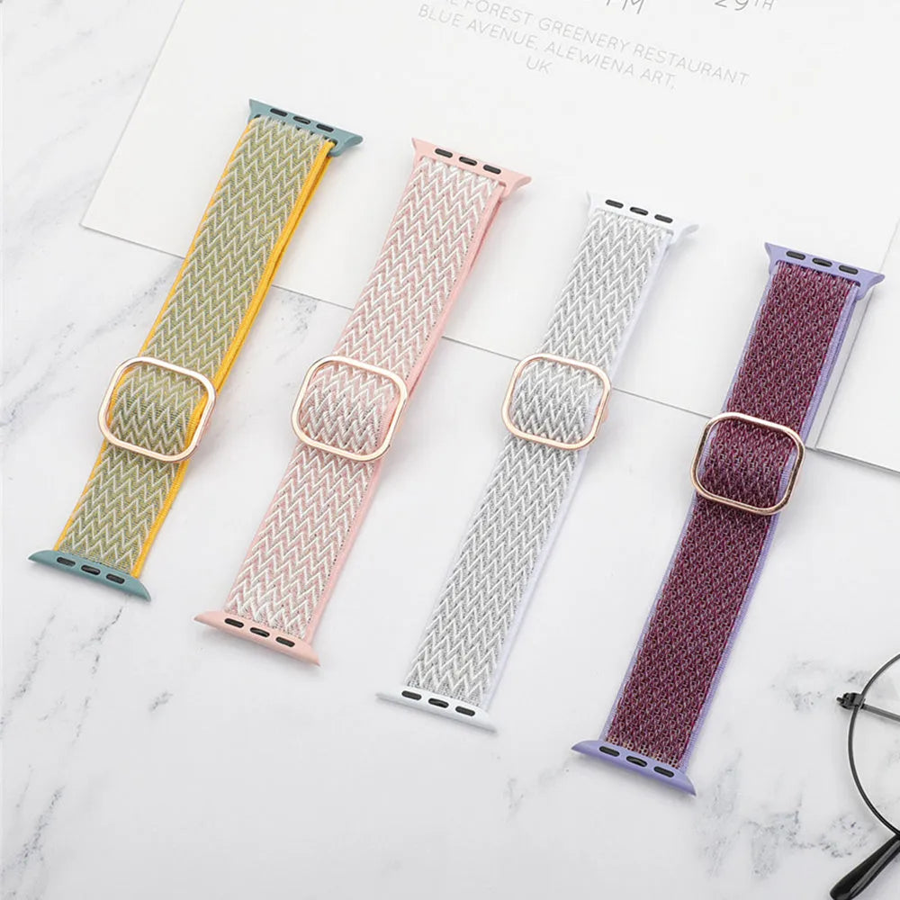Nylon wave pattern elastic strap for Apple Watch in multiple colour options on a wrist.