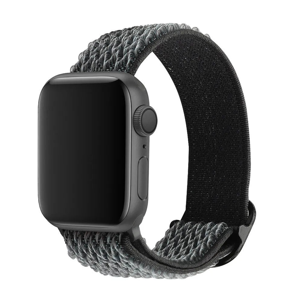Nylon wave pattern elastic strap for Apple Watch in multiple colour options on a wrist.