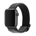 Nylon wave pattern elastic strap for Apple Watch in multiple colour options on a wrist.